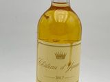 a bottle of wine that is sitting on a table