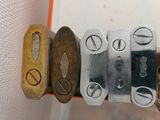 a close up of a bunch of keys on a hook