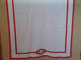 an image of a table cloth with a red border on it