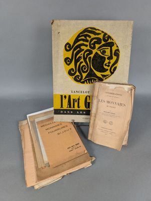 three books are sitting on top of a table next to each other