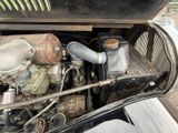 a close up of an old car engine with a lot of rust