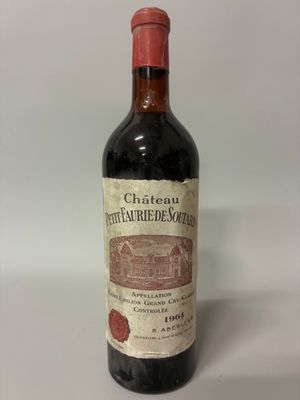 a bottle of wine that is sitting on a table