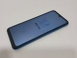 a close up of the back of a blue samsung s9