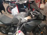 a motorcycle that is parked in a garage