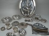 a lot of silver items that are on the table