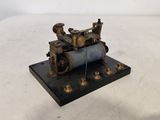 a small model of a steam engine on a table