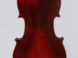 an antique violin with a wooden back and bow