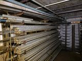 a room filled with lots of metal pipes and pipes