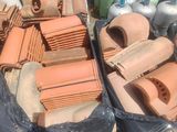 many different types of roofing materials on the ground