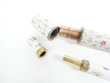 a white umbrella with a gold handle and a white umbrella with a gold handle