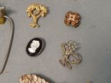 many different types of jewelry on the table