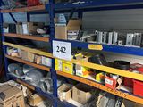 many boxes of assorted items on shelves in a warehouse