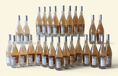 many bottles of wine that are arranged in a pyramid