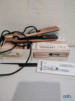 several different types of hair straightens are sitting on top of a table