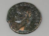 une image d'une pièce de monnaie sur laquelle figure un visage