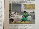 an open book with a picture of a woman sitting on a bed