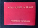 red book with french writing on it sitting on a black surface