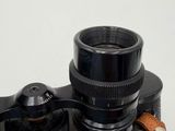 a close up of a pair of binoculars on a table