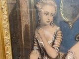 a painting of a woman in a blue dress in a gold frame