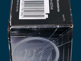 a black box with a red and white label on it