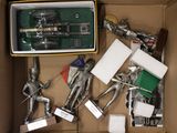 a box full of silver figurines in a box
