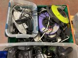 a plastic container filled with electronics and other items