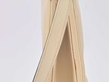 leather handbag with strap and zipper closure on a white background