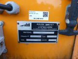a close up of a sign on the side of a yellow machine