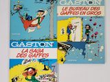trois livres posés sur une surface blanche, avec la photo d'un homme sur un skateboard