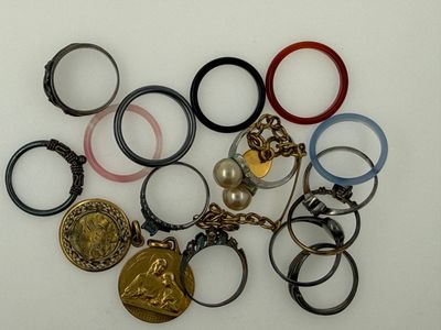 a lot of rings that are sitting on a table