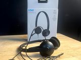 a box with a pair of headphones on top of it
