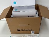 an open cardboard box with a white and blue package inside of it