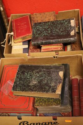 a box full of books sitting on the floor
