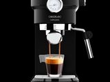 a close up of a coffee machine with a cup of coffee