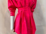 a woman ' s pink shirt dress on a mannequin mannequin mannequin mannequin mannequin mannequin mannequin manne