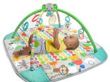 the baby is playing with his toy on the play mat