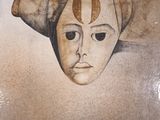 painting of a mask with a hat on top of it on a table