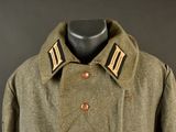 an image of a military coat on a mannequin head