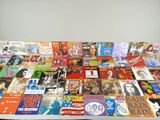 a lot of magazines on a table with a white background