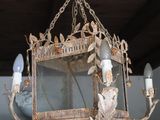 a chandelier hanging from the ceiling in a room