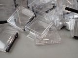 a lot of clear boxes that are on a table