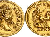 a gold coin with a horse and rider on it