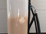 a machine that is sitting on a cart in a garage