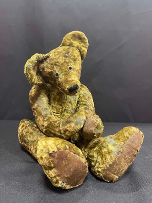 a teddy bear that is sitting on a table