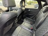 the interior of a car with black leather seats and black leather trims