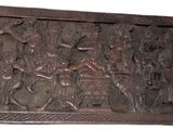 an old wooden panel with carvings on it on a white background
