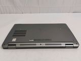 an open laptop computer sitting on top of a white table