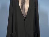 an image of a suit on a mannequin stand