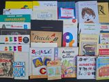a lot of books that are on the table