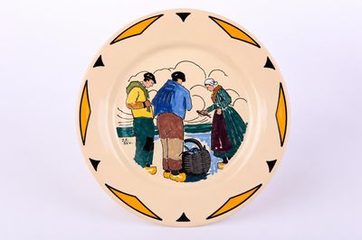 a plate with a picture of a man and a woman on it